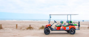 Golf cart from Port A Beach Buggies on beach in Port Aransas