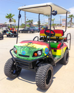 Salt Life Golf Cart with red, yellow and green stripes.