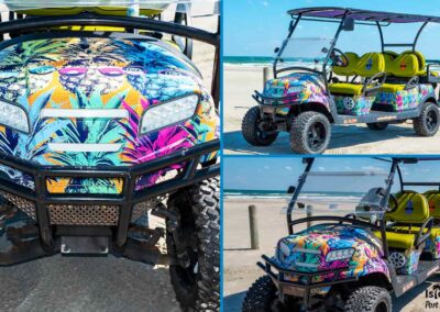 6-passenger golf cart decorated with brightly colored pineapples