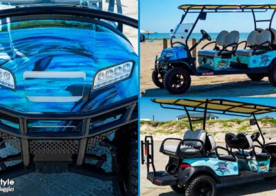 Blue beach buggy with photo of a dolphin on front and sides