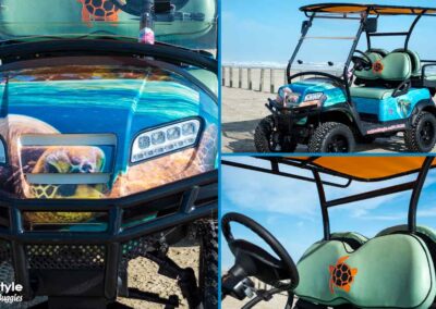 Beach buggy with turtle image on front and blue water and turtles on the side