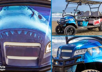 Blue beach buggy with Shark Attack in red letters on the side