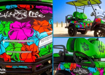 Buggy decorated with colorful hibiscus.