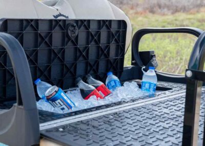 ice chest full of water bottles and ice